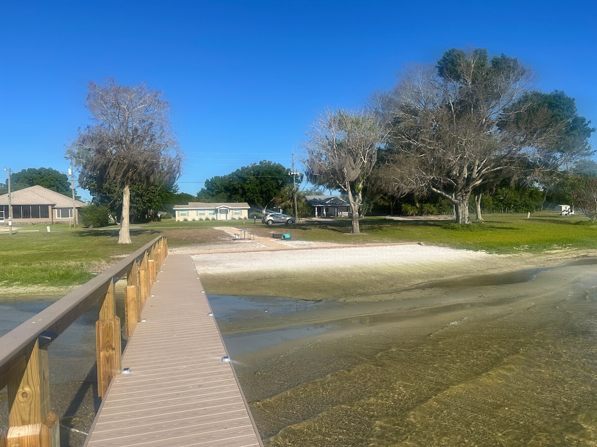 Private pier and beach on Lake Jackson in Sebring